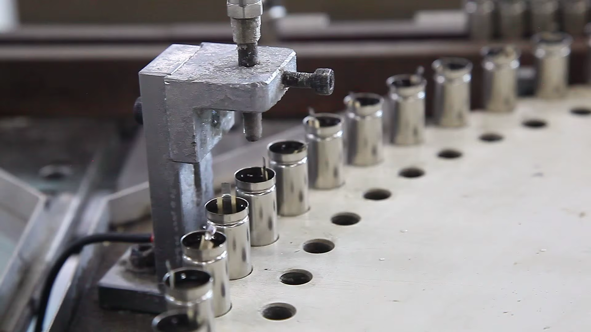 Battery cans on a production line at the PUJIMAX factory